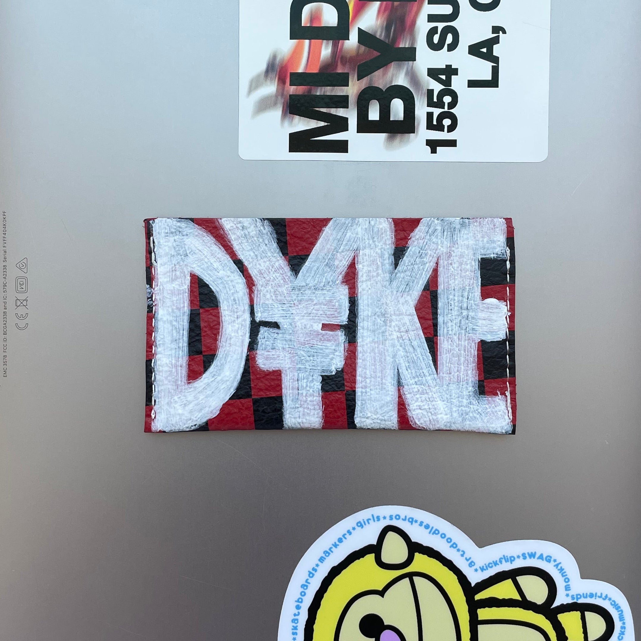 “D¥KE” leather card holder